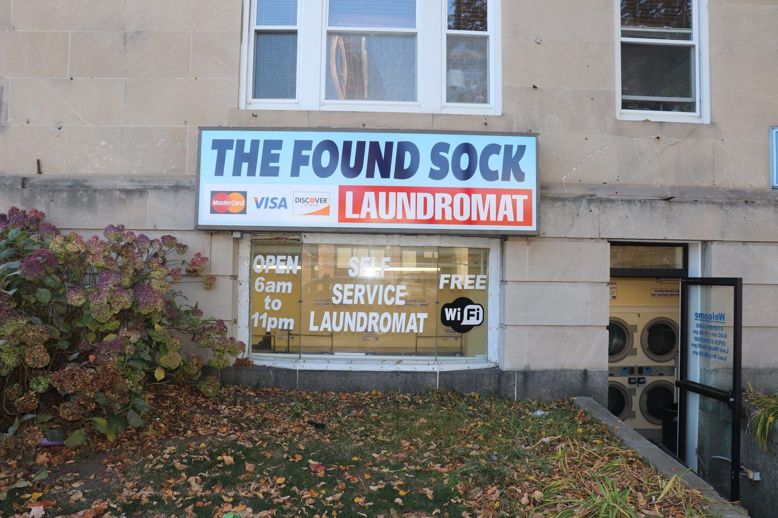 Storefront of The Found Sock Laundromat at 76 Washington St, Brighton MA